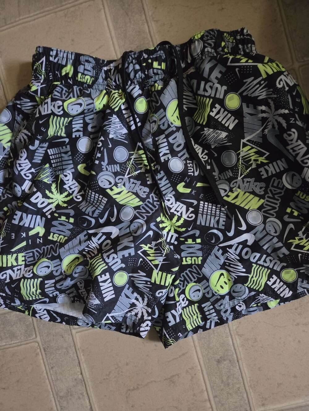 Nike Men’s Black and Neon Green Graphic Athletic Shorts